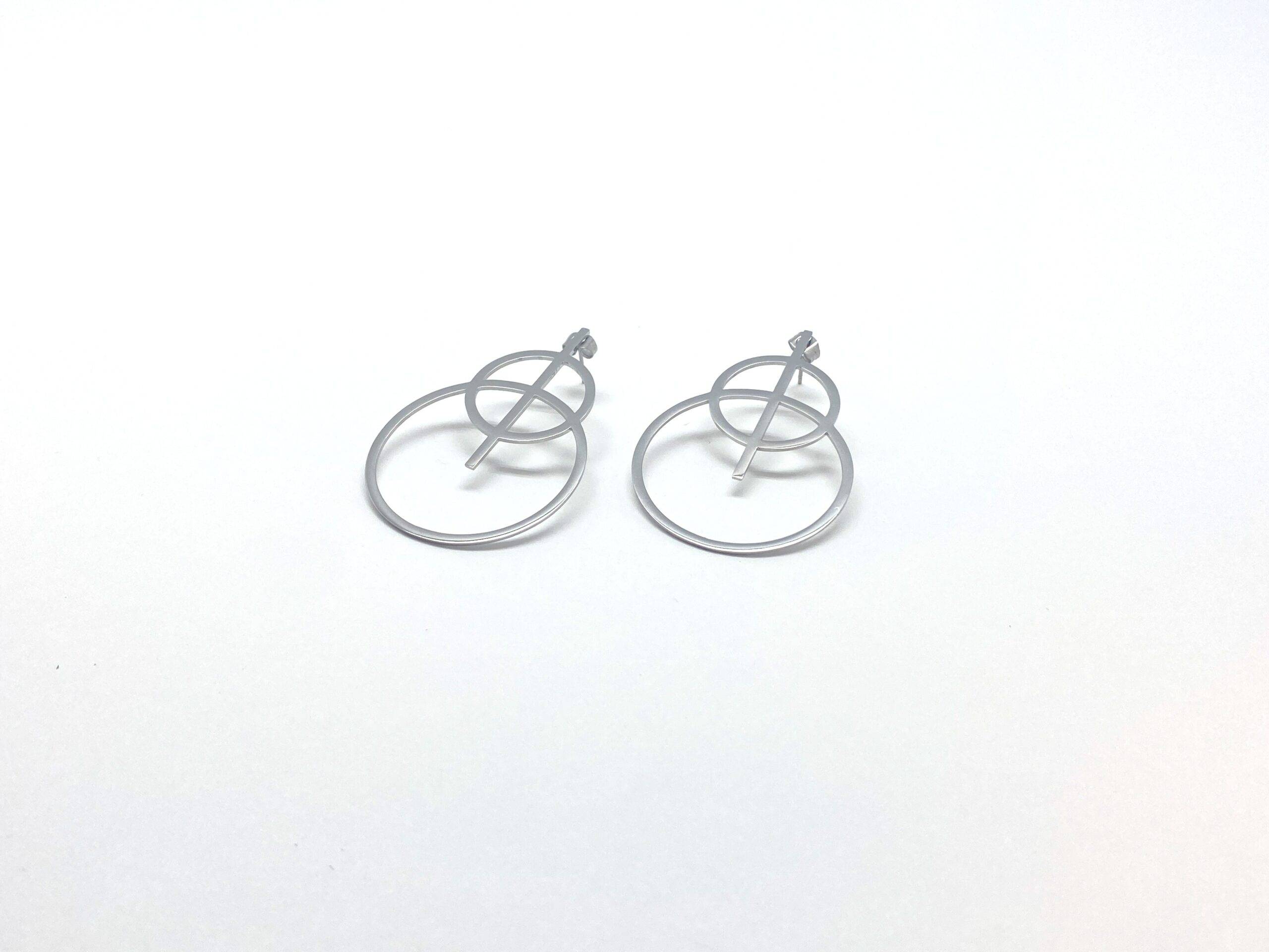 Celestial statement earrings with sacred cross design in steel