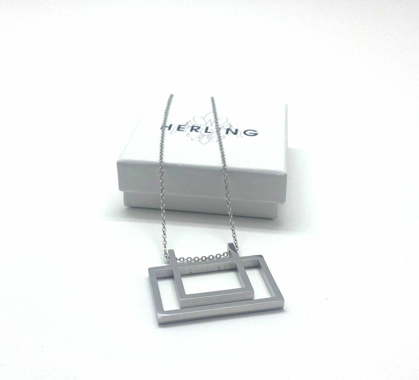 Modern geometric pendant necklace in stainless steel