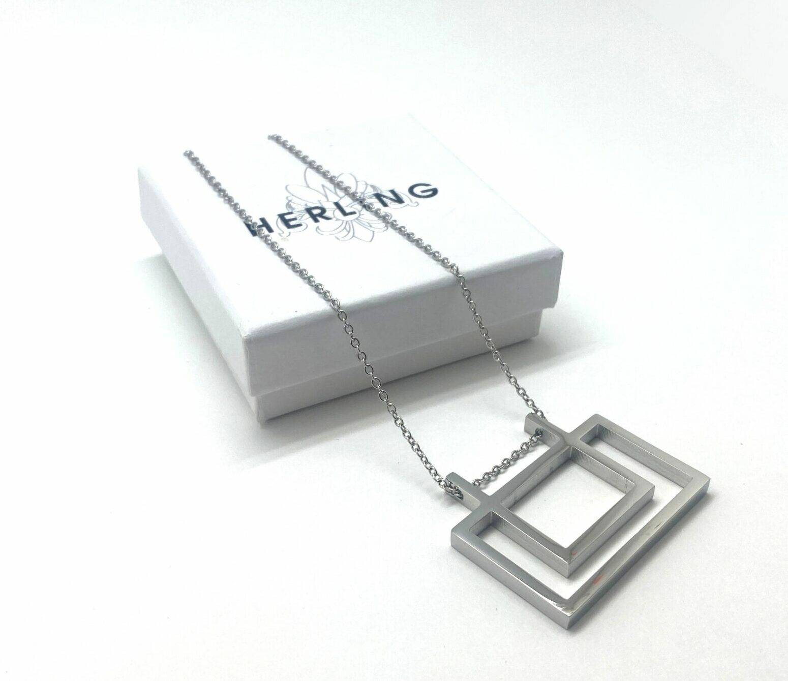 Modern geometric pendant necklace in stainless steel