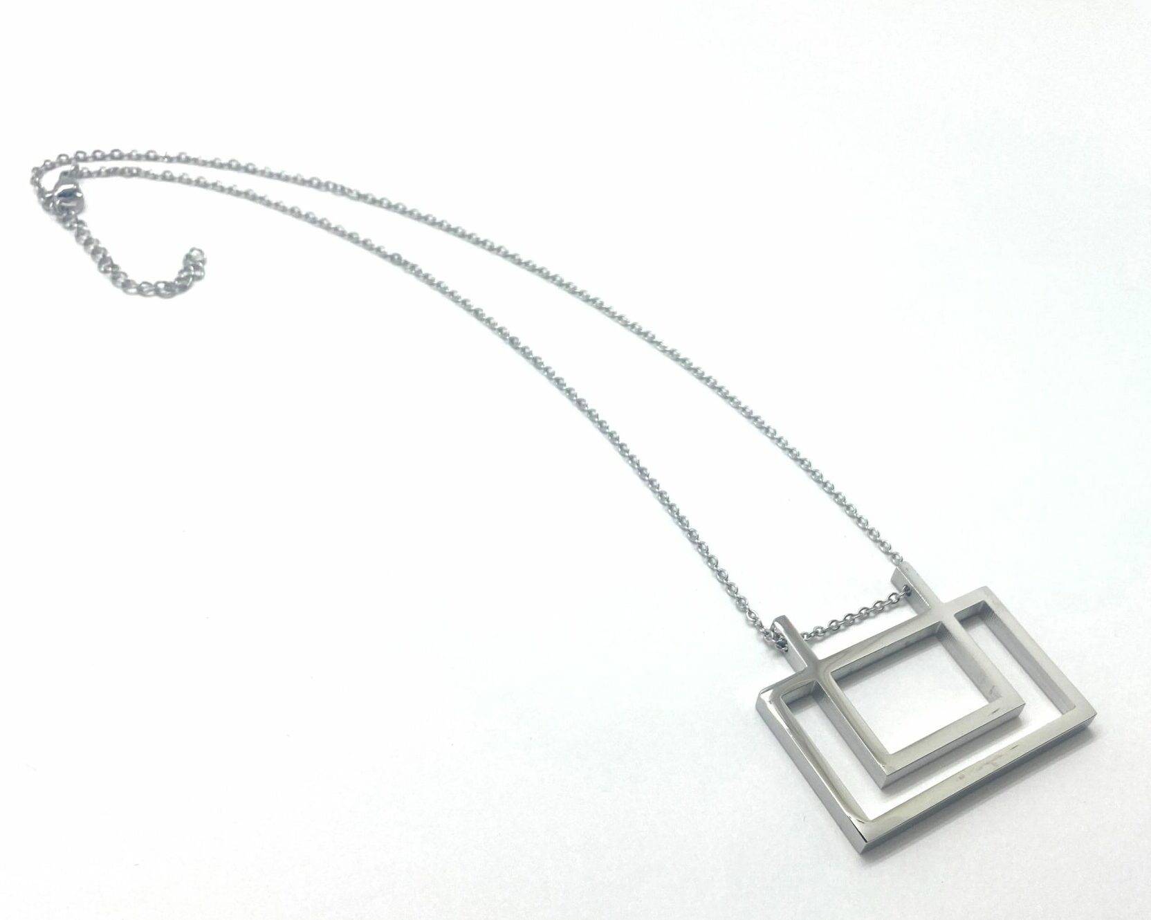 Modern geometric pendant necklace in stainless steel