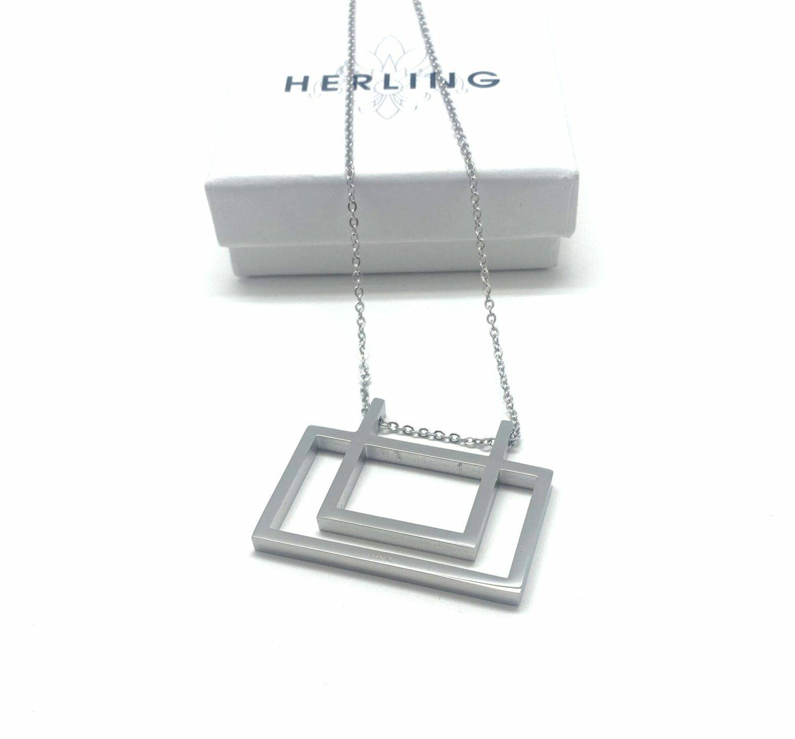 Modern geometric pendant necklace in stainless steel