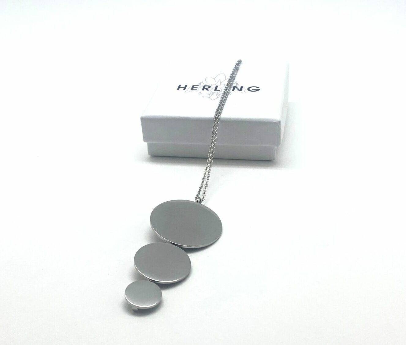 Architectural disc pendant necklace in stainless steel