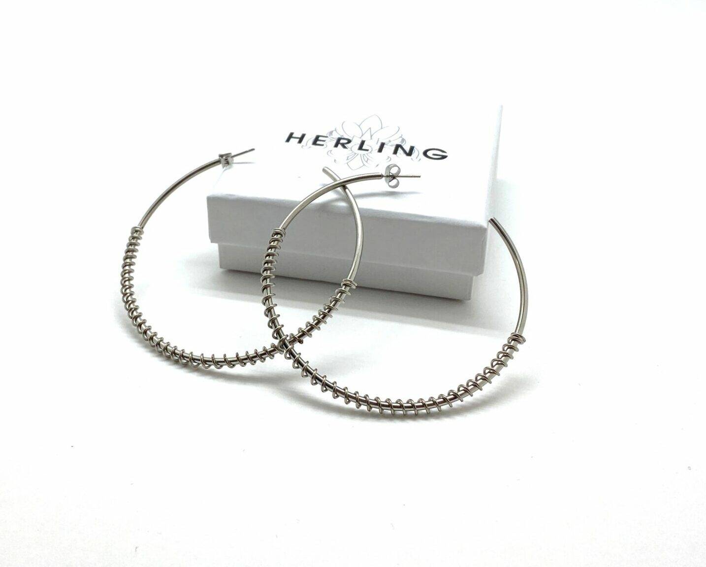 Twisted hoop earrings in premium stainless steel with spiral design