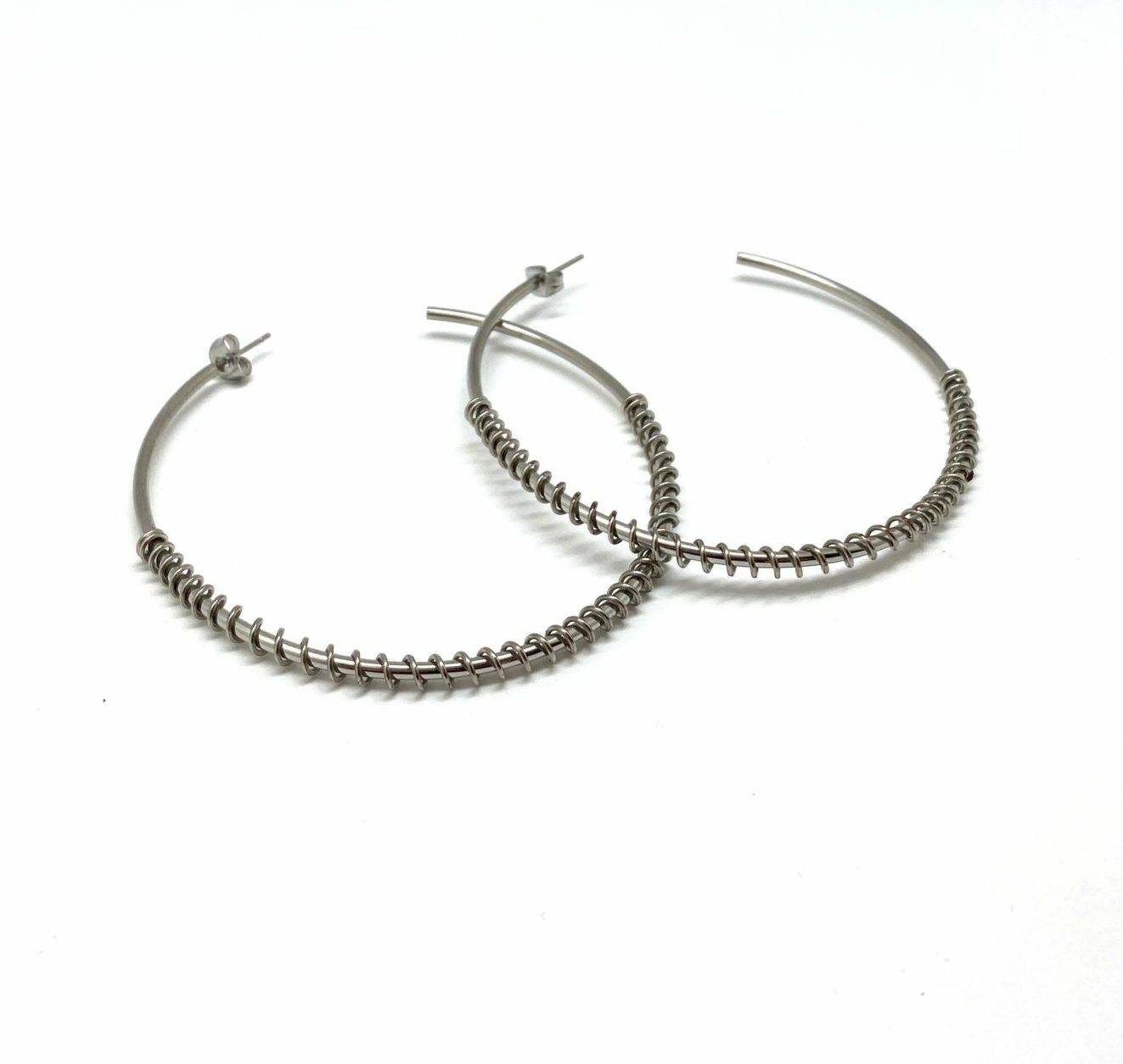 Twisted hoop earrings in premium stainless steel with spiral design