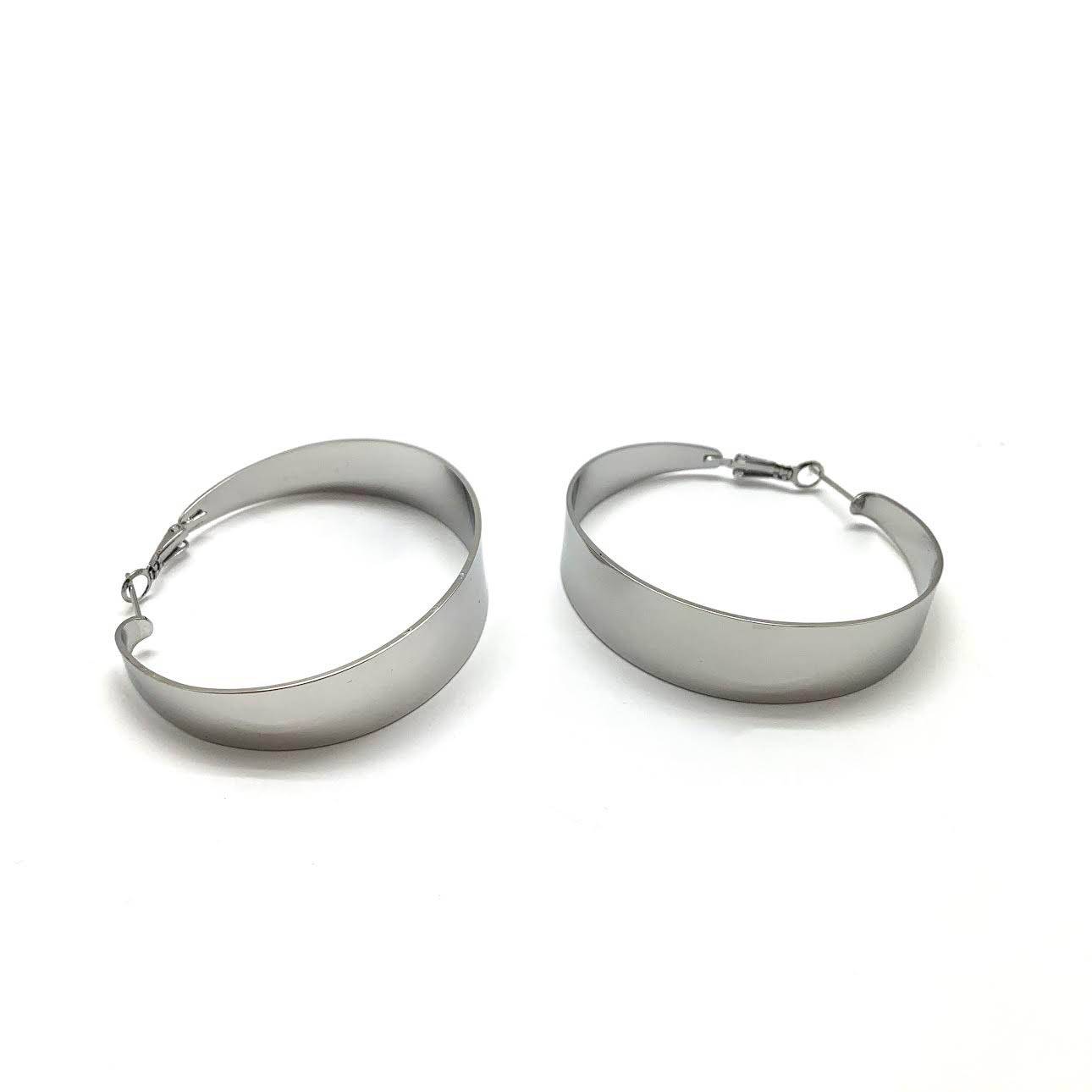 Silver Wave Hoop Earrings by HerlinG