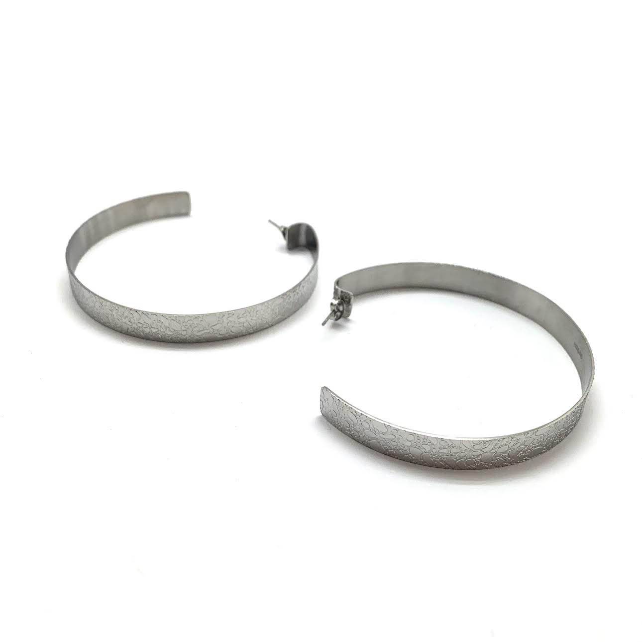 Sleek textured stainless steel hoops in silver finish | HerlinG