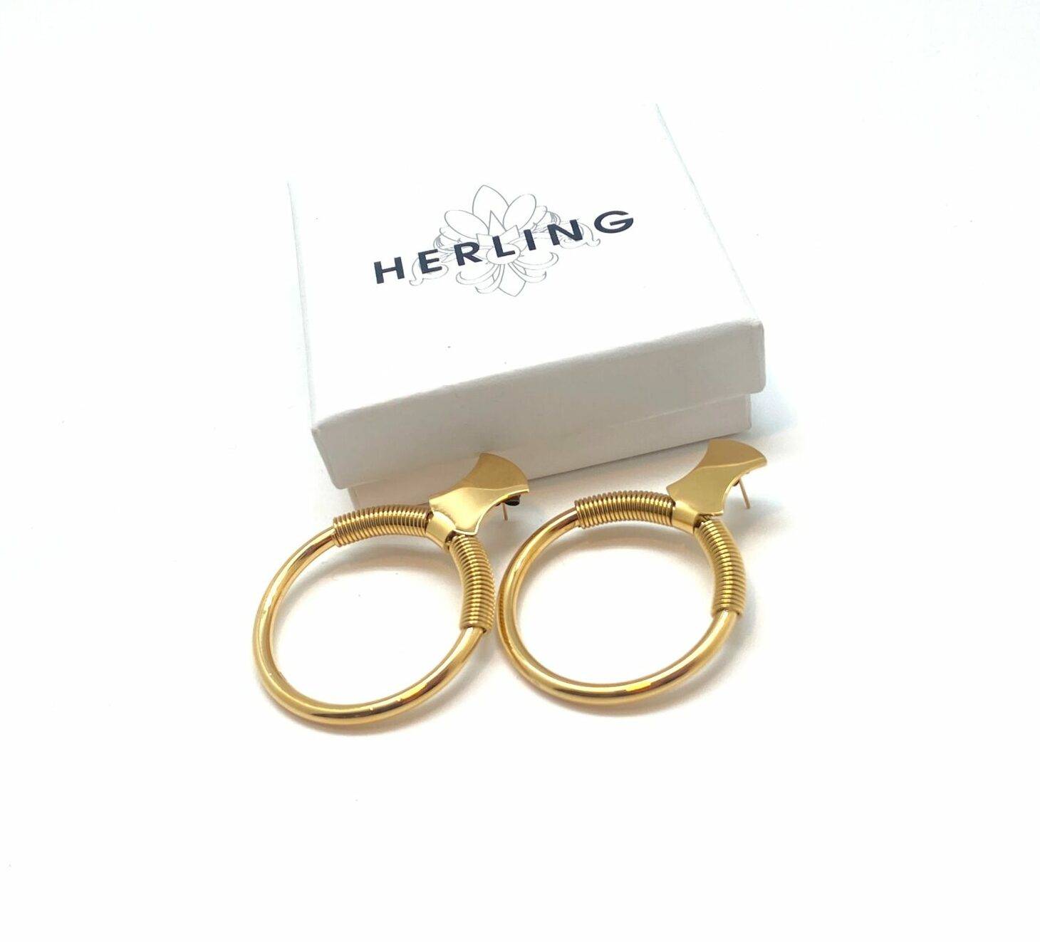 Helix Wing designer gold hoop earrings with spiral detail