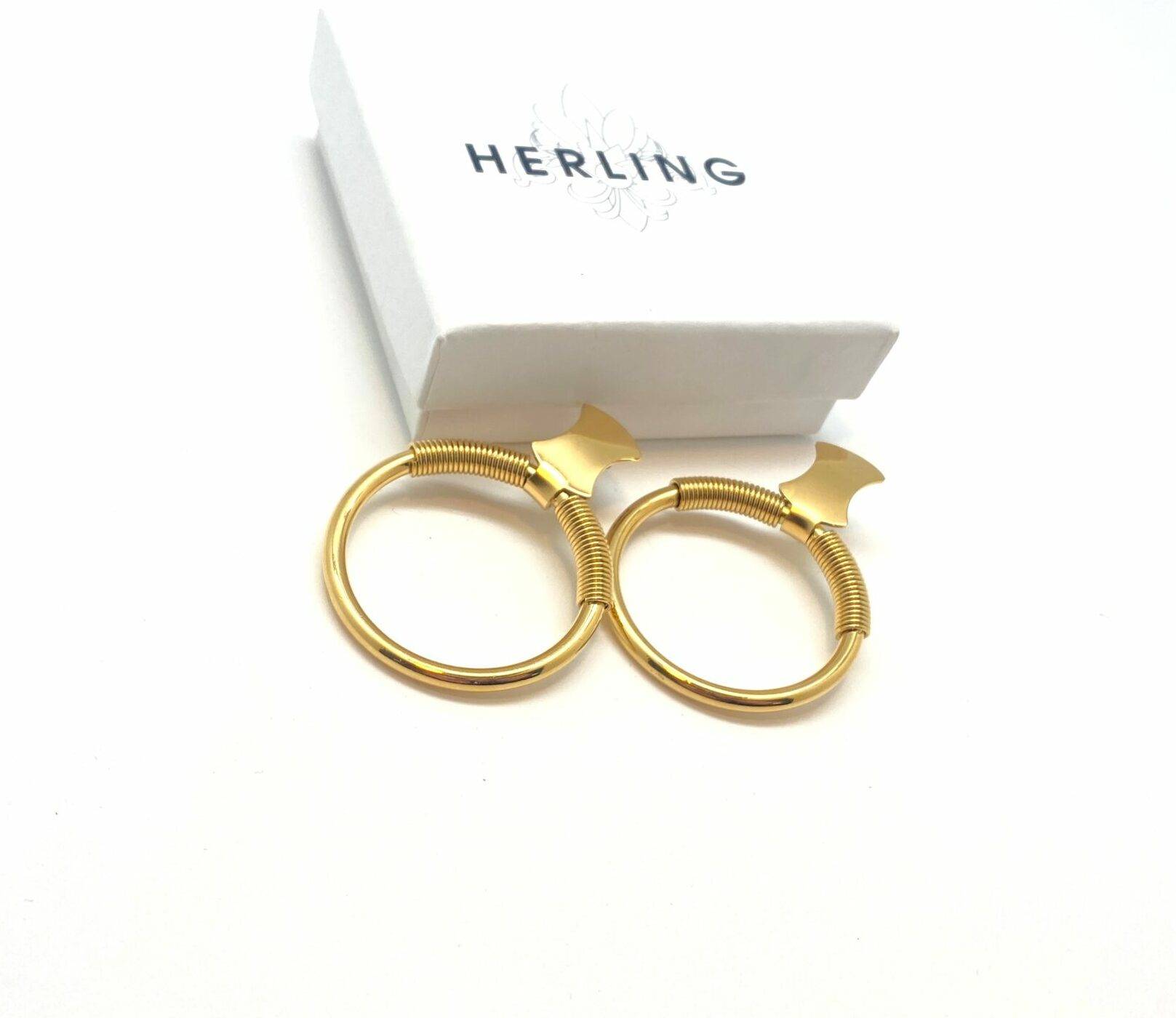 Helix Wing designer gold hoop earrings with spiral detail