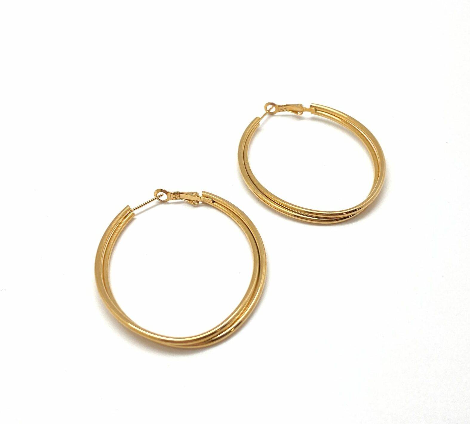 Eclipse textured hoop earrings in electroplasma gold