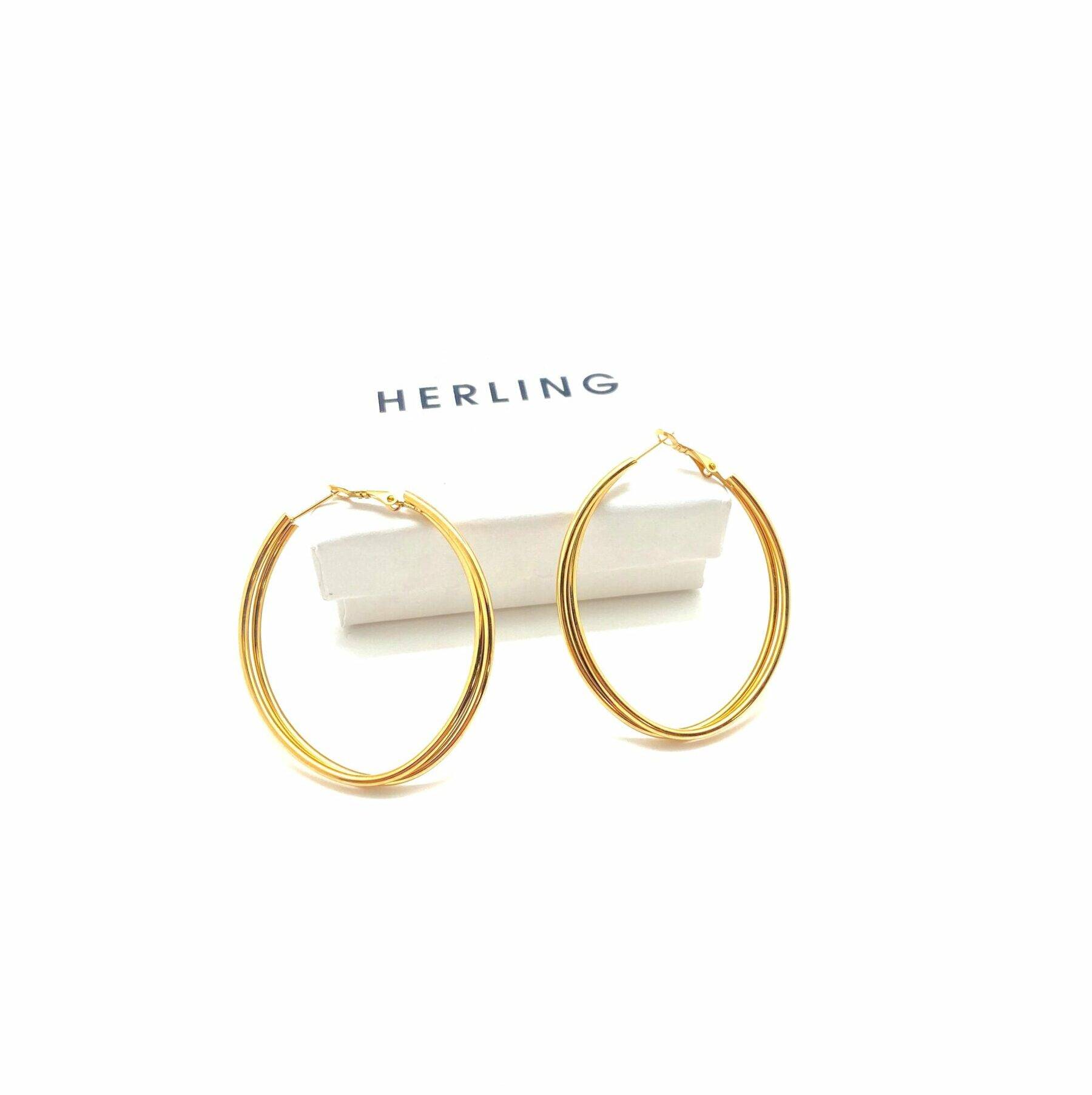 Eclipse textured hoop earrings in electroplasma gold