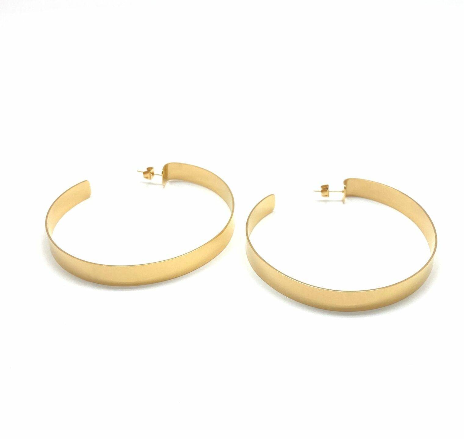 Gold big hoop earrings with modern design