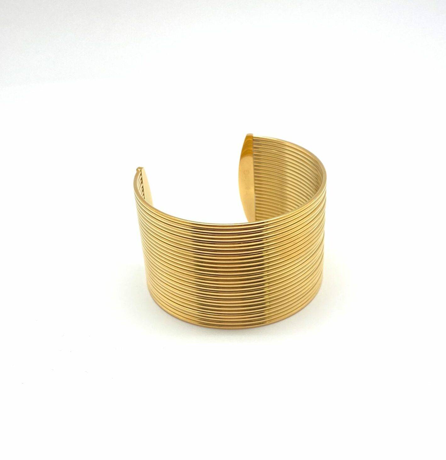 Gold textured cuff bracelet with parallel ripple design