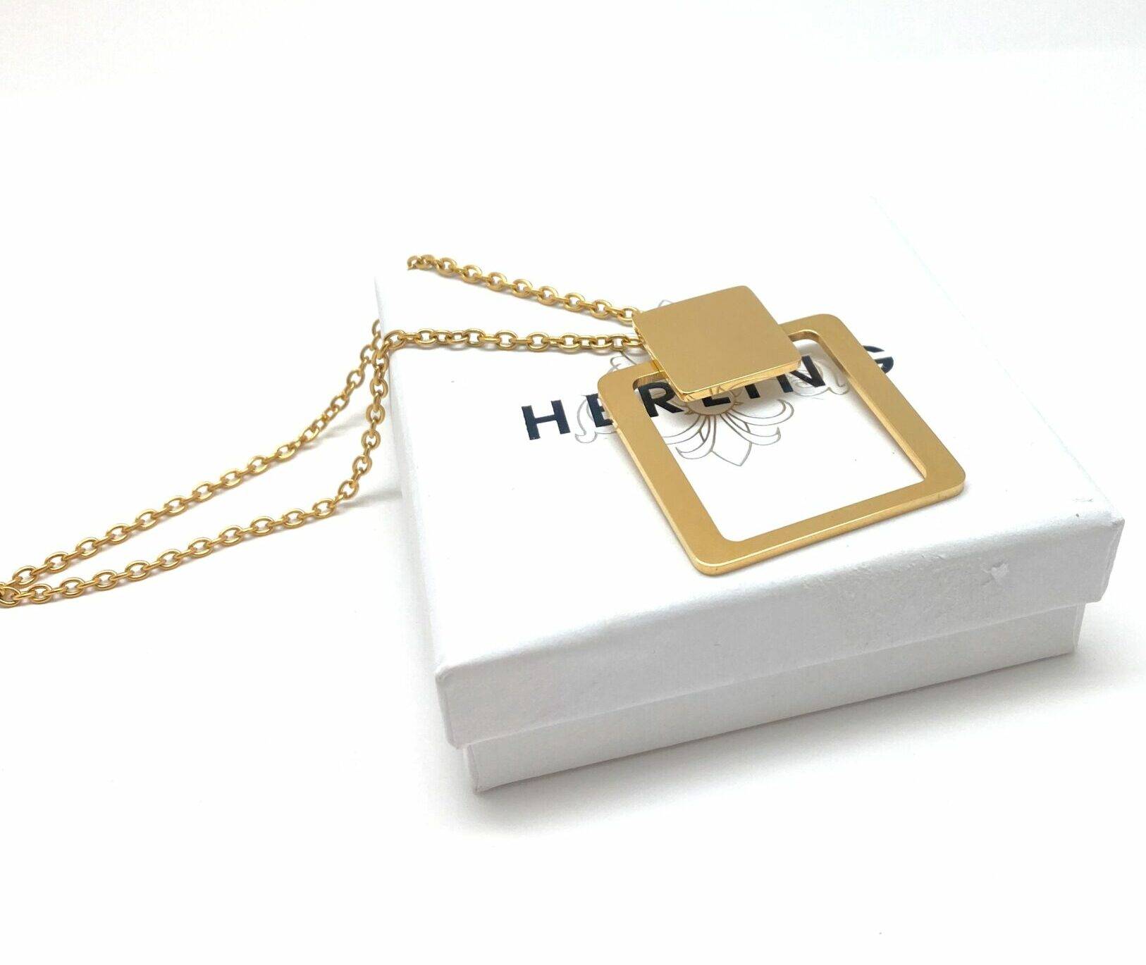 Gold square pendant necklace with modern design