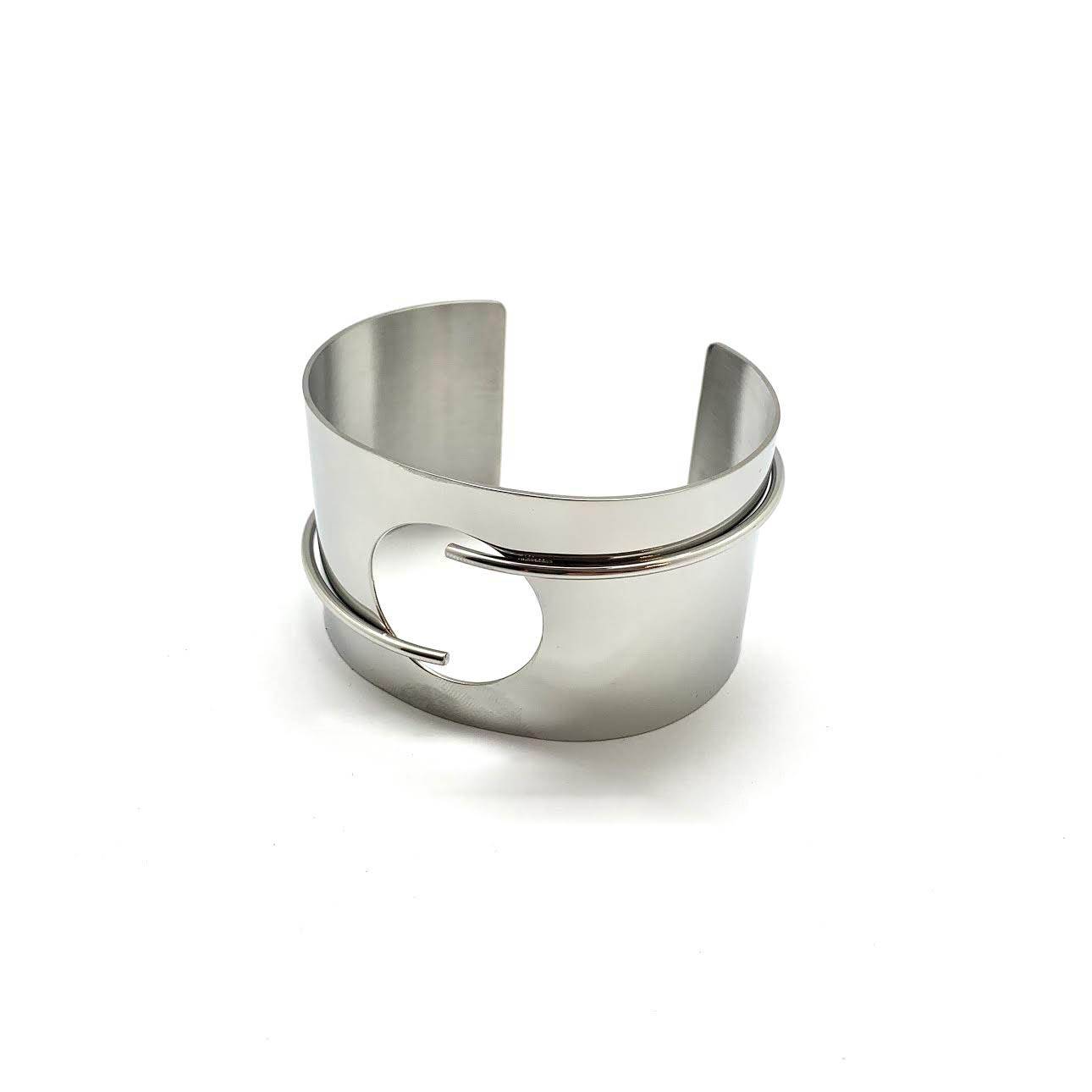 Modern cuff bracelet with circular cutout design in premium stainless steel