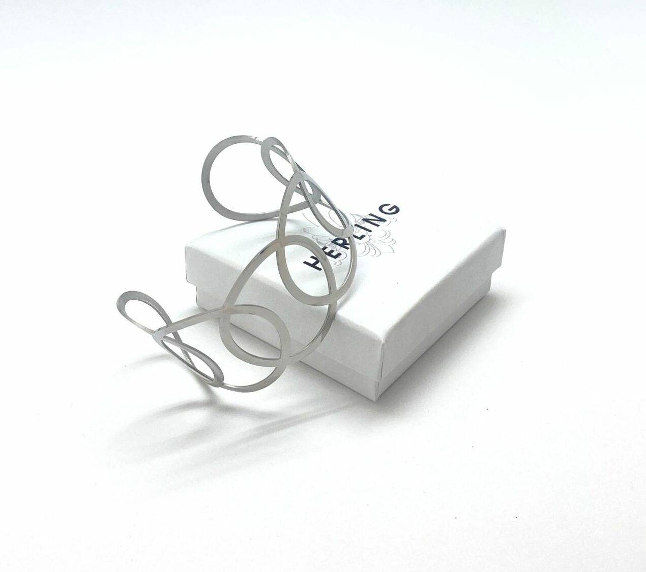 Infinity steel cuff bracelet in polished stainless steel