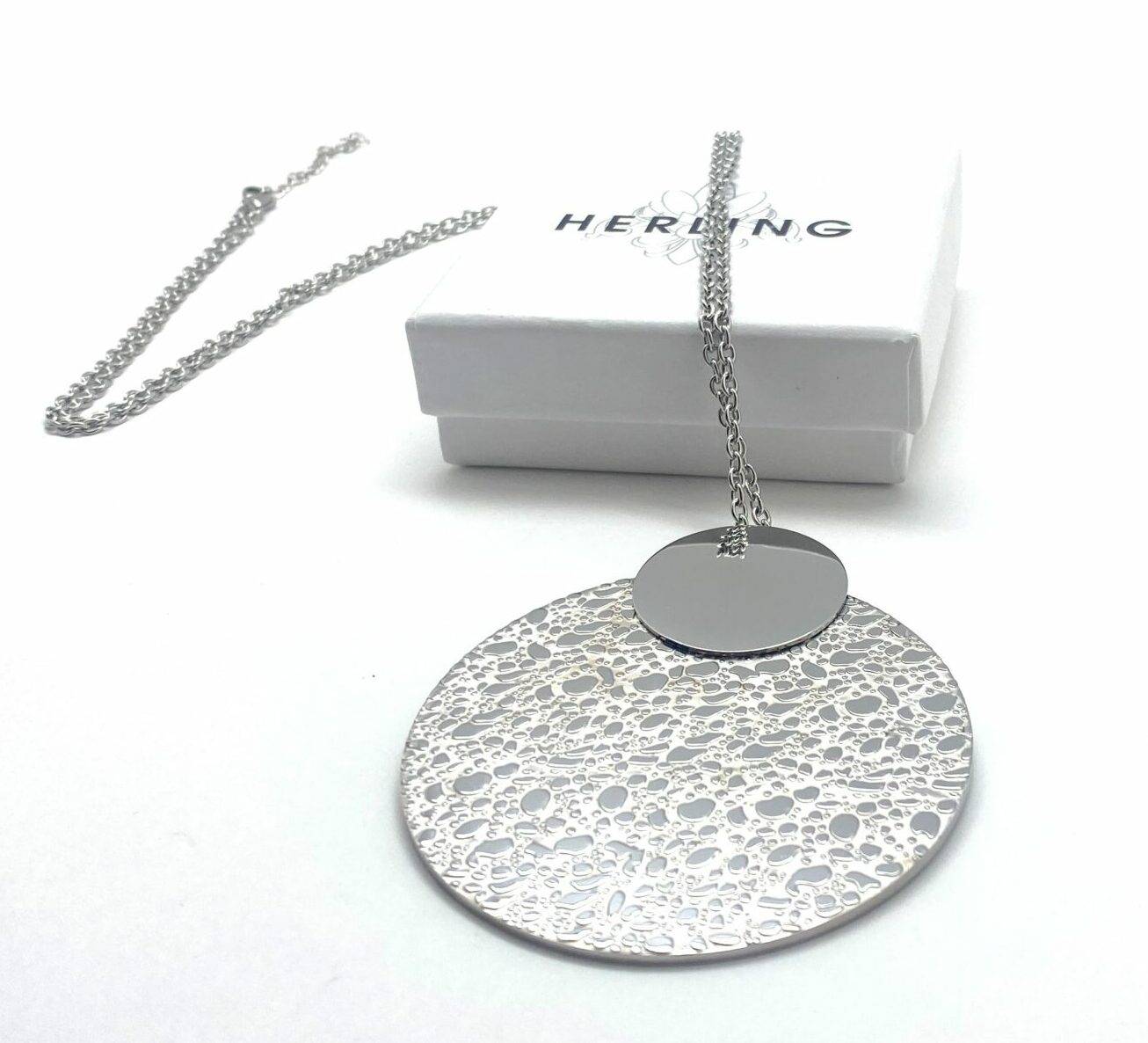 Long pendant necklace with textured disc in steel